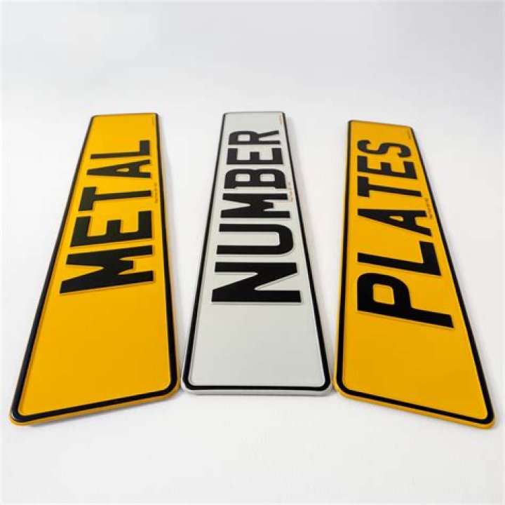 Are black metal number plates legal?