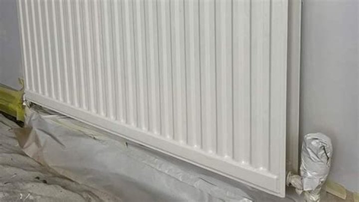 Can radiators be used to cool a house?