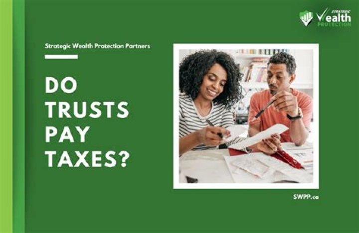 Do Living trusts pay taxes?