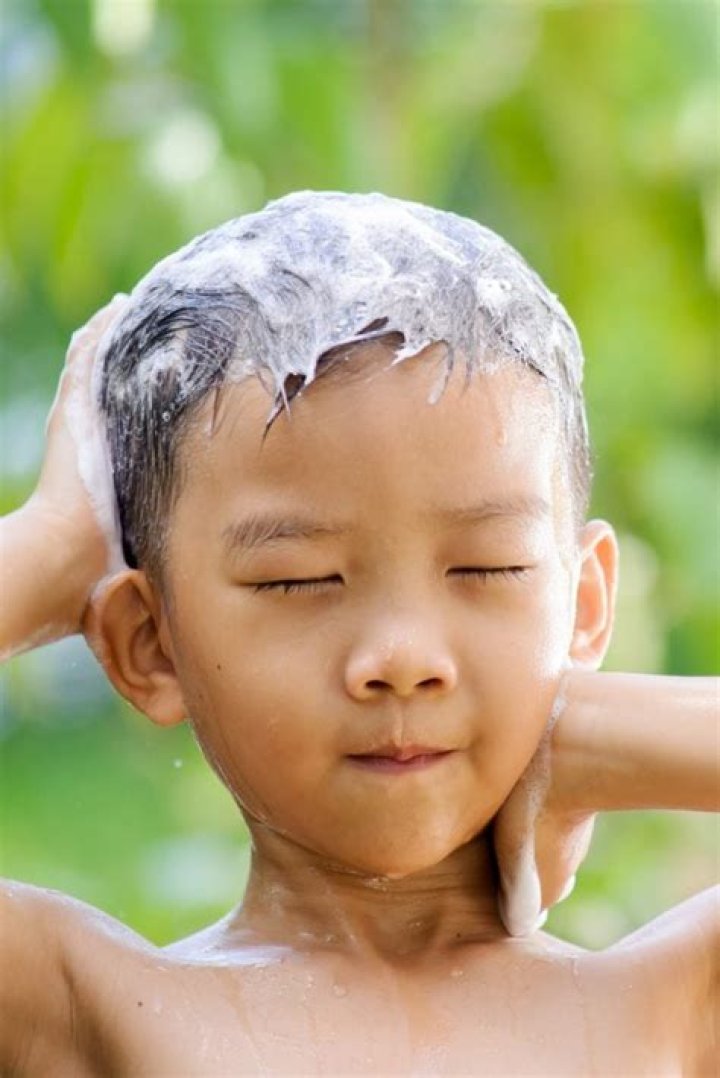How often should an 11 year old wash their hair?