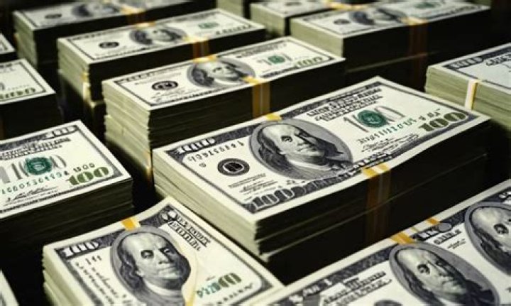 How thick is a stack of 100000?