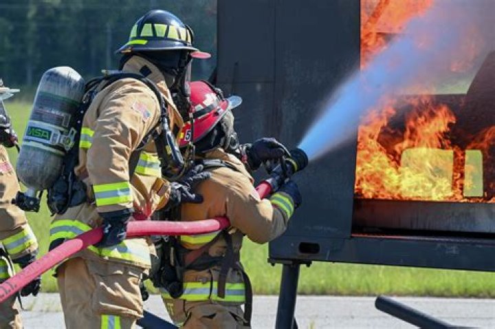 What does a professional firefighter do?
