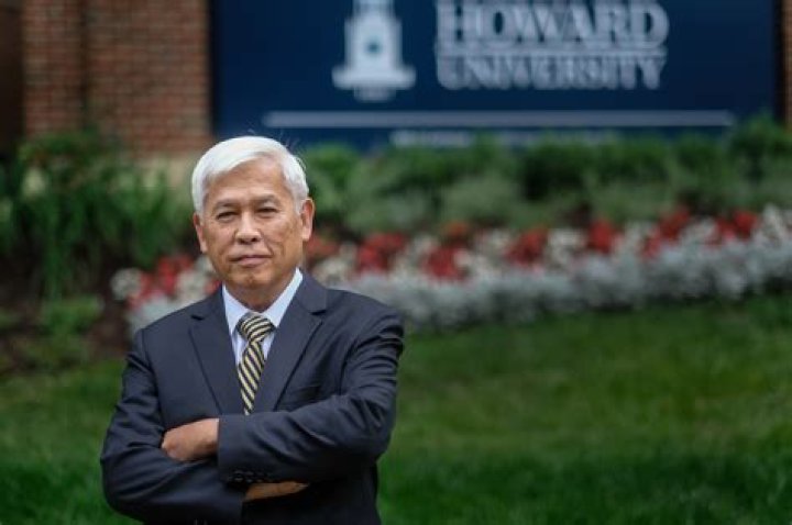 What is a visiting scholar at a university?