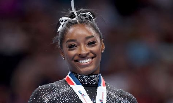 Why did Biles quit?
